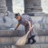 Woman Cleaning Garni Temple